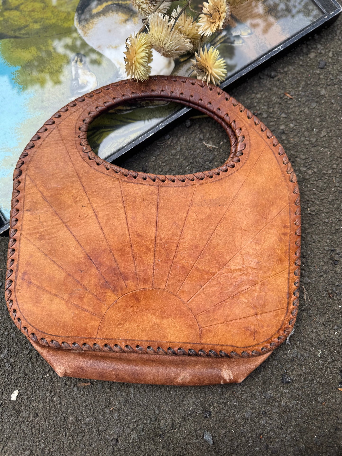 Star burst sun leather tooled bag