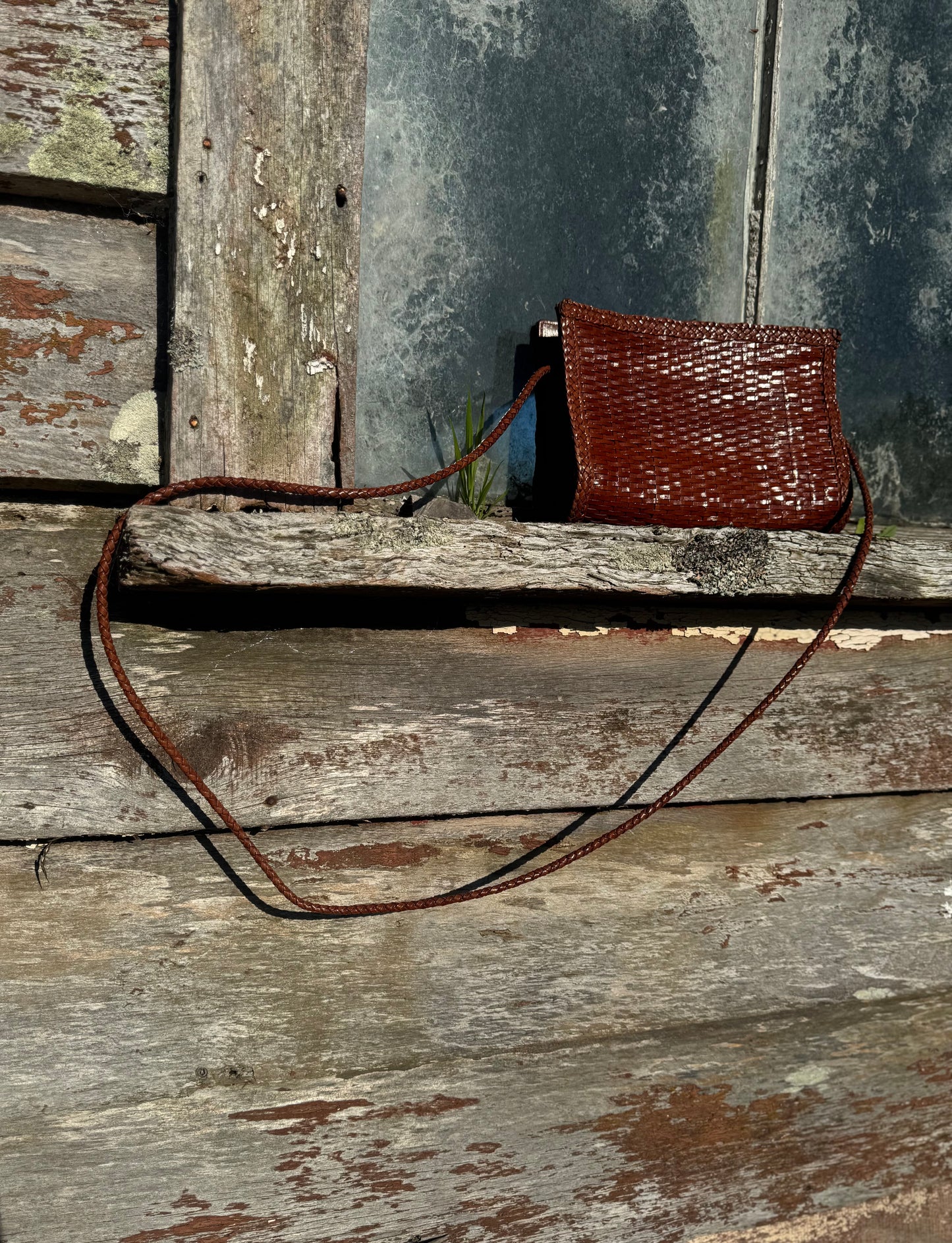 Woven leather hand bag
