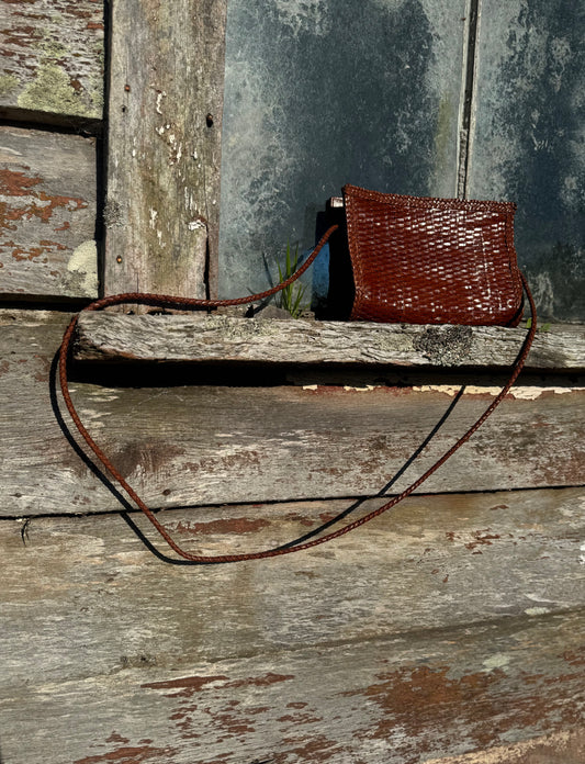 Woven leather hand bag