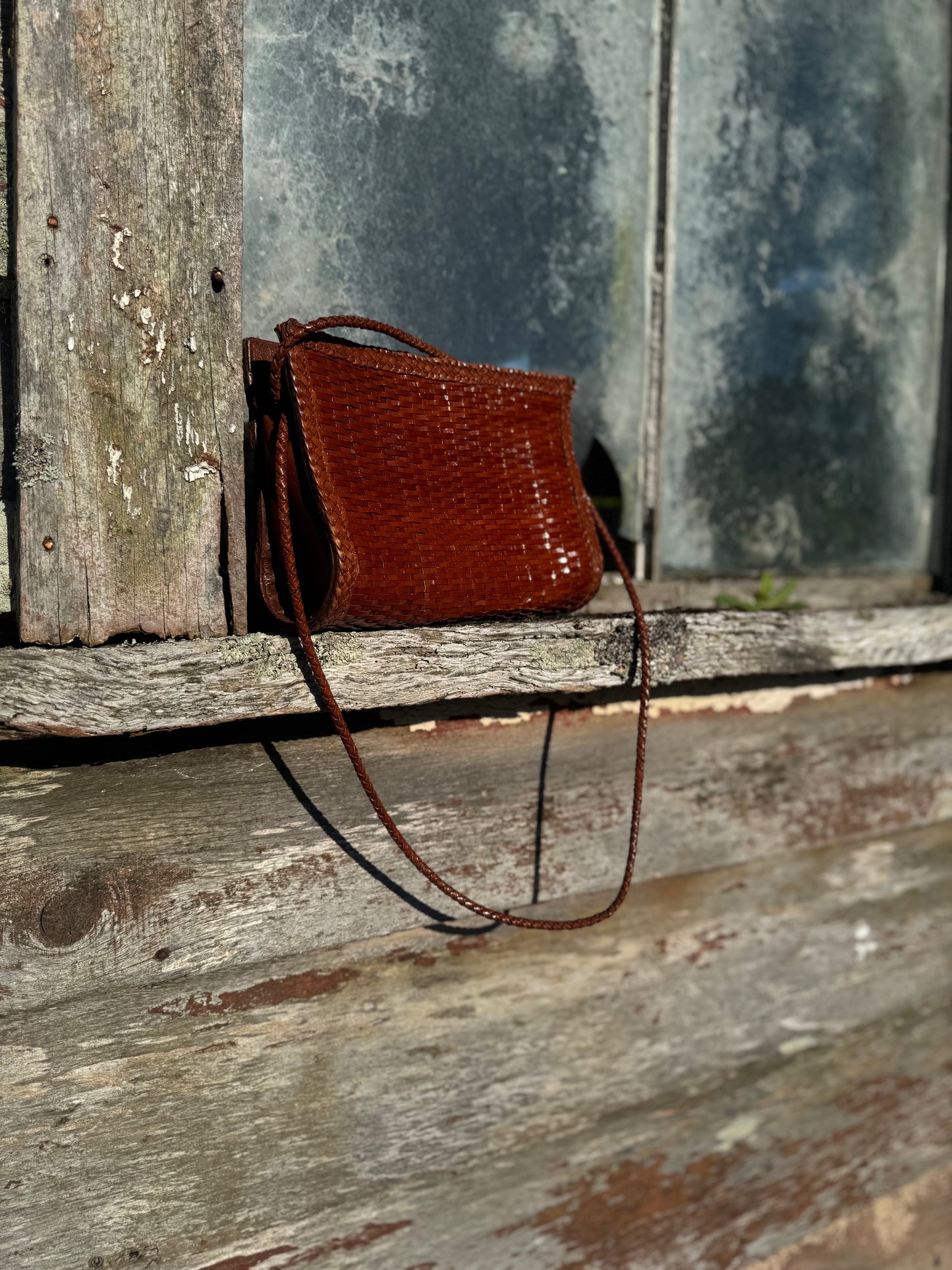 Woven leather hand bag