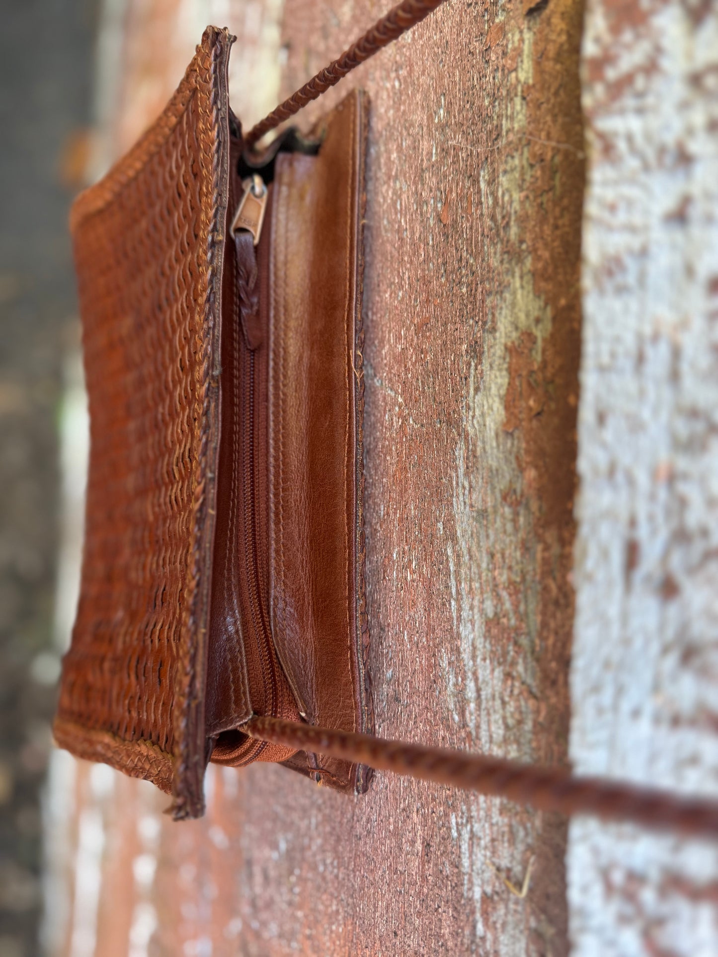 Woven leather hand bag