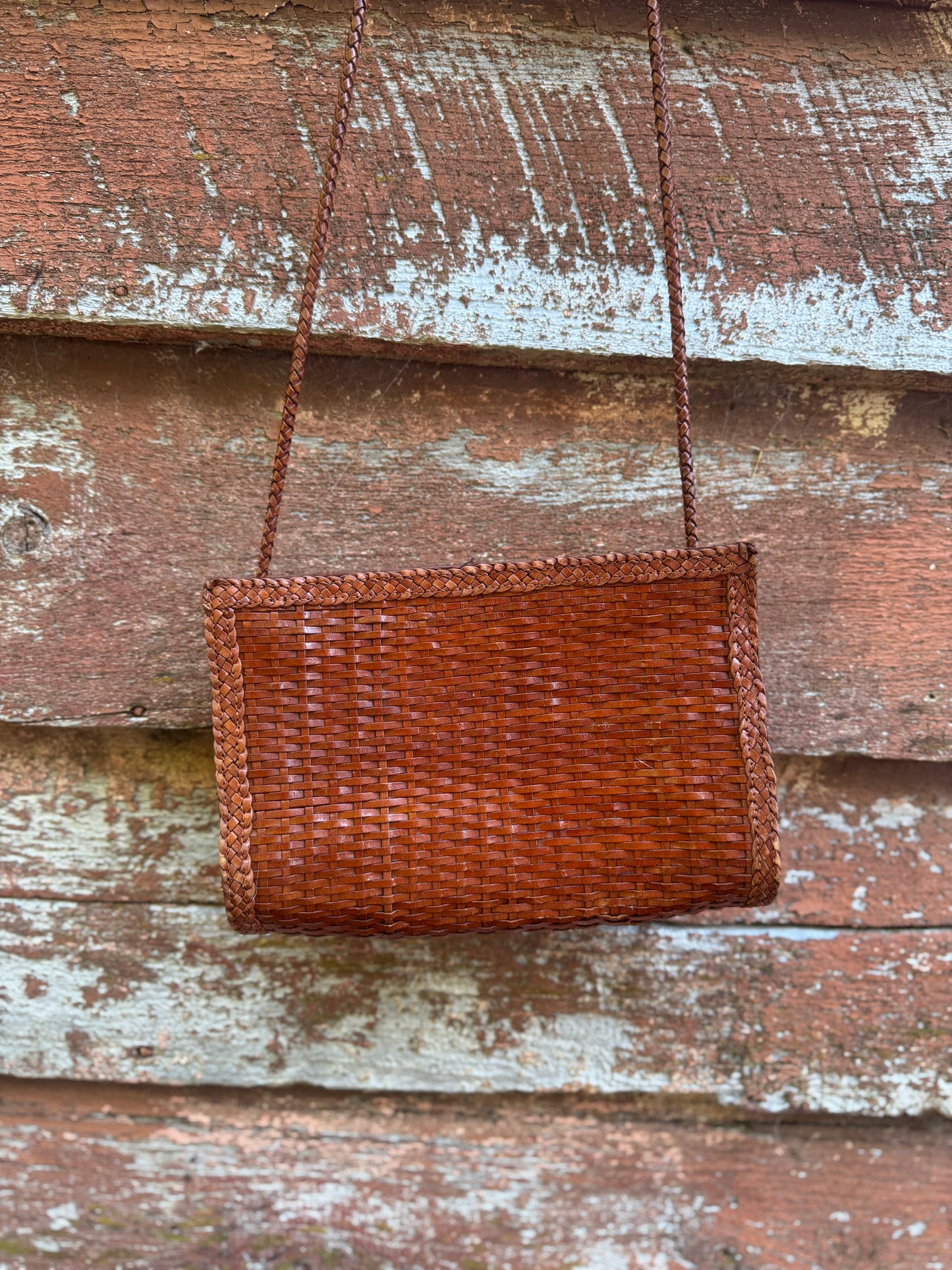 Woven leather hand bag
